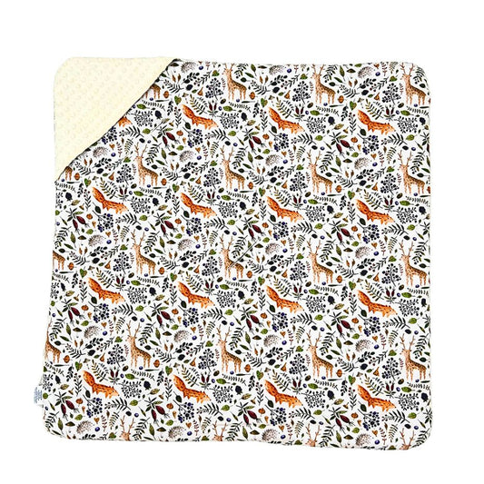 Bramble car seat blanket for a 3-point harness, patterned cotton side laid flat