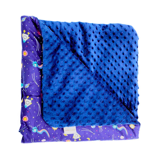 Rocketman car seat blanket for a 5-point harness, folded to show the patterned cotton and navy minky sides