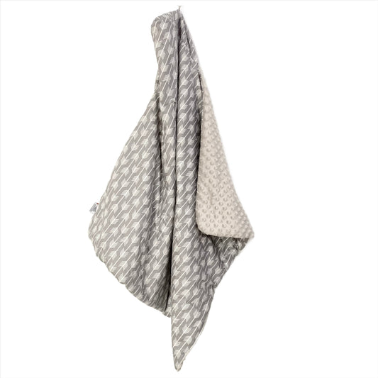 Grey Arrow car seat blanket for a 3-point harness, hanging to show the patterned cotton and grey minky sides