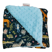 Load image into Gallery viewer, Blue Safari Animals car seat blanket for a 3-point harness, folded to show the patterned cotton and light blue minky sides