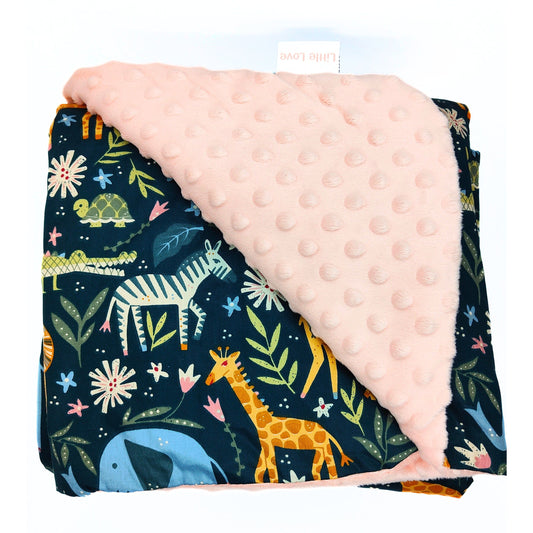 Pink Safari Animals car seat blanket for a 3-point harness, folded to show the patterned cotton and peach minky sides