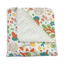 Load image into Gallery viewer, Jack car seat blanket for a 3-point harness, folded to show the patterned cotton and cream minky sides