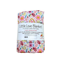 Load image into Gallery viewer, Rainbow car seat blanket, rolled up in its Little Love Blanket paper band