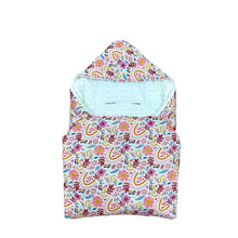 Load image into Gallery viewer, Rainbow car seat blanket, patterned side out, folded with the white minky hood