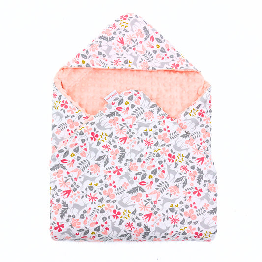 Little Deer car seat blanket for a 5-point harness, patterned side out, folded with the peach minky hood