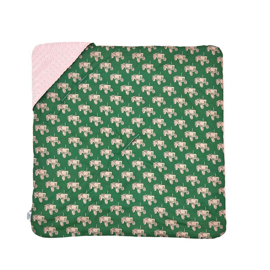 Pink Tractor car seat blanket, patterned cotton side laid flat