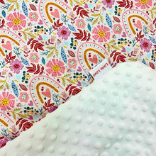 Load image into Gallery viewer, Rainbow car seat blanket, close-up of the patterned cotton and white minky fabrics