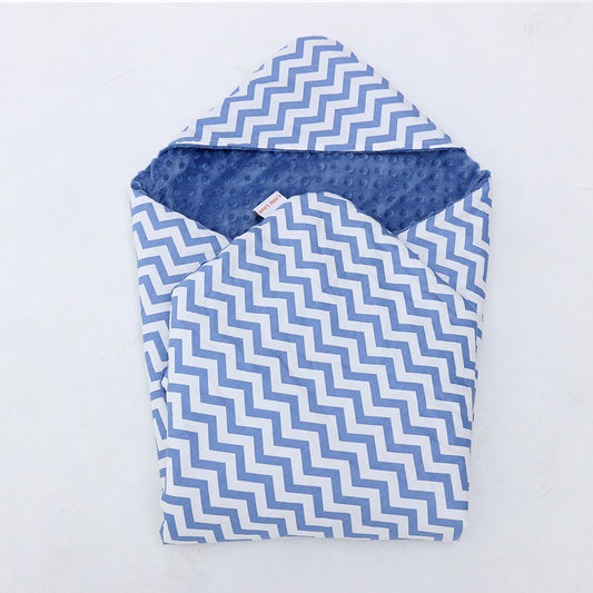 Blue Chevron car seat blanket for a 3-point harness, patterned side out, folded with the blue minky hood