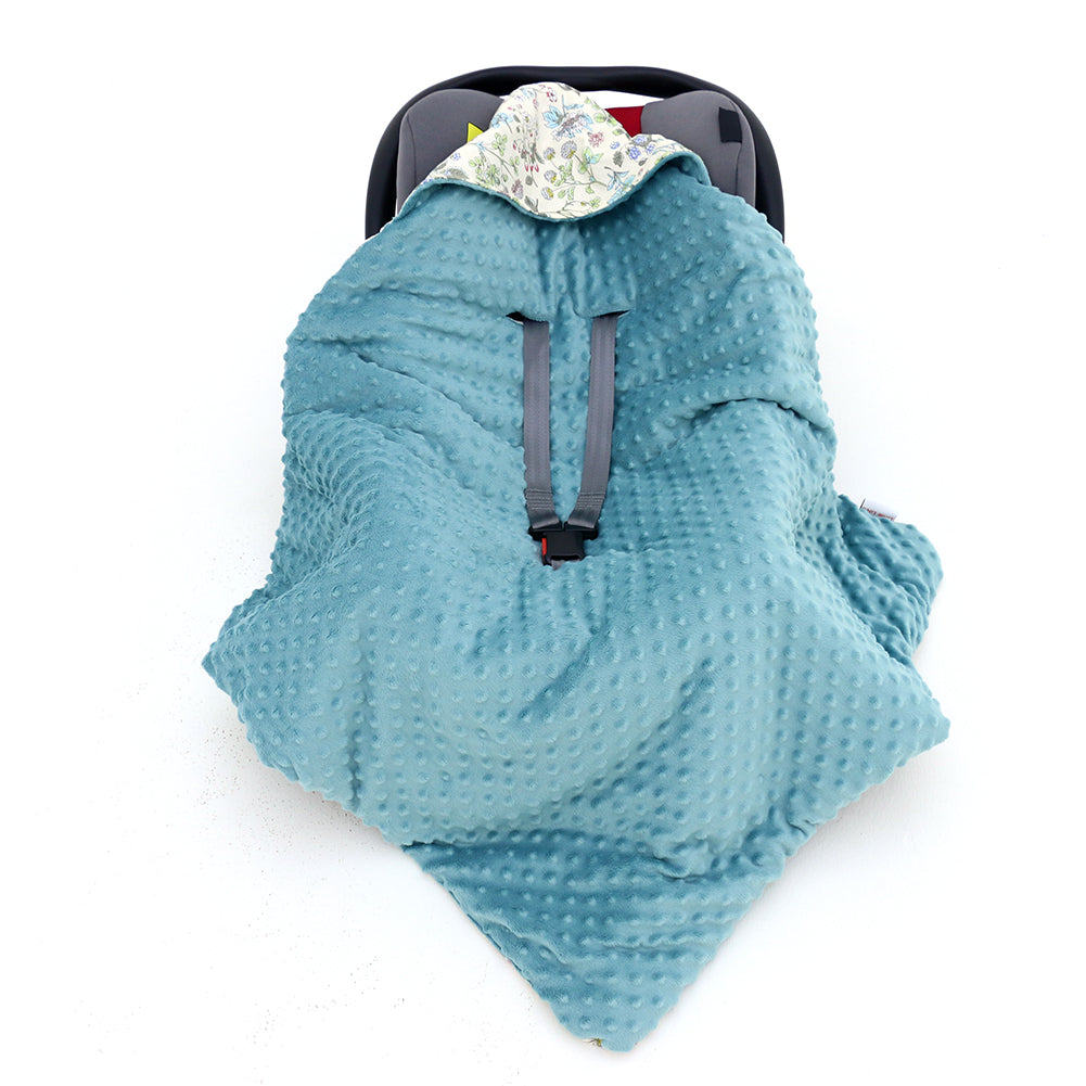 Wildflower car seat blanket for a 3-point harness, teal minky side out, fitted over an infant car seat