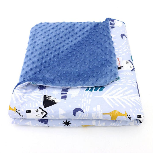 Winter Navy car seat blanket for a 5-point harness, folded to show the patterned cotton and blue minky sides