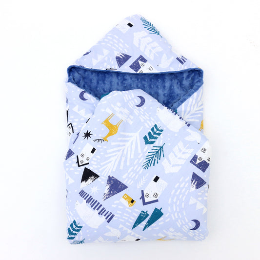 Winter Navy car seat blanket for a 3-point harness, patterned side out, folded with the blue minky hood