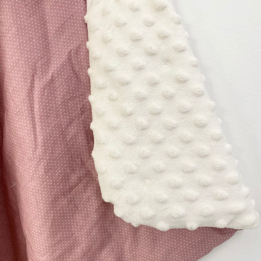 Pink Spot car seat blanket for a 3-point harness, close-up of the patterned cotton and cream minky fabrics