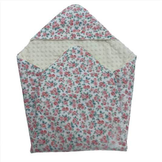 Rose car seat blanket for a 3-point harness, patterned side out, folded with the cream minky hood